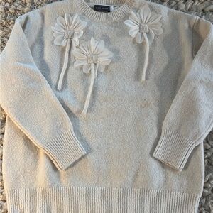 Elegant Cream Sweater with Floral Accents